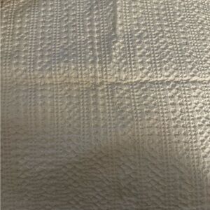 Elegant Textured Beige Fabric